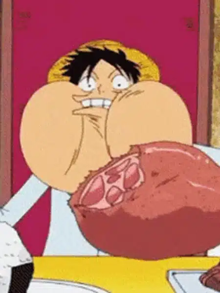 Monkey D. Luffy davanti a un grande pezzo di carne in One Piece